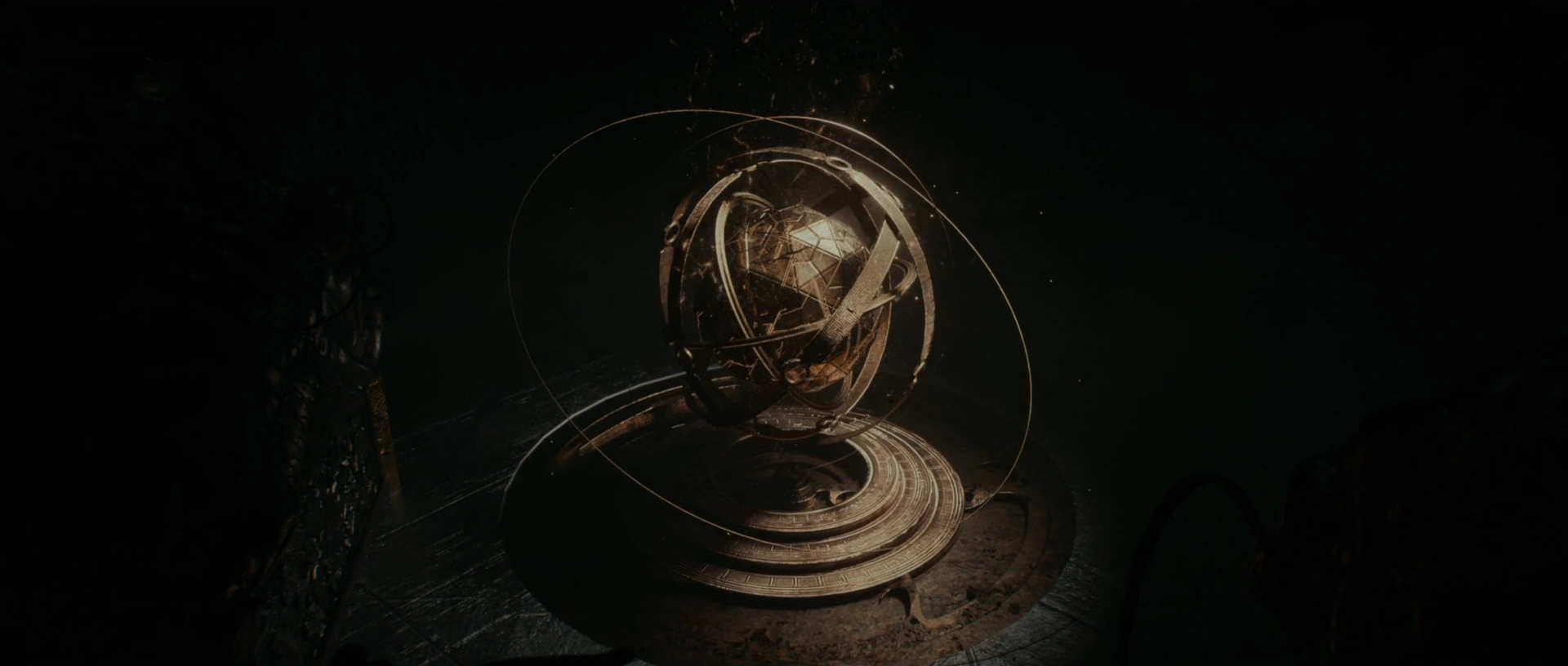 An illuminated golden sphere and concentric rings above a circular base.