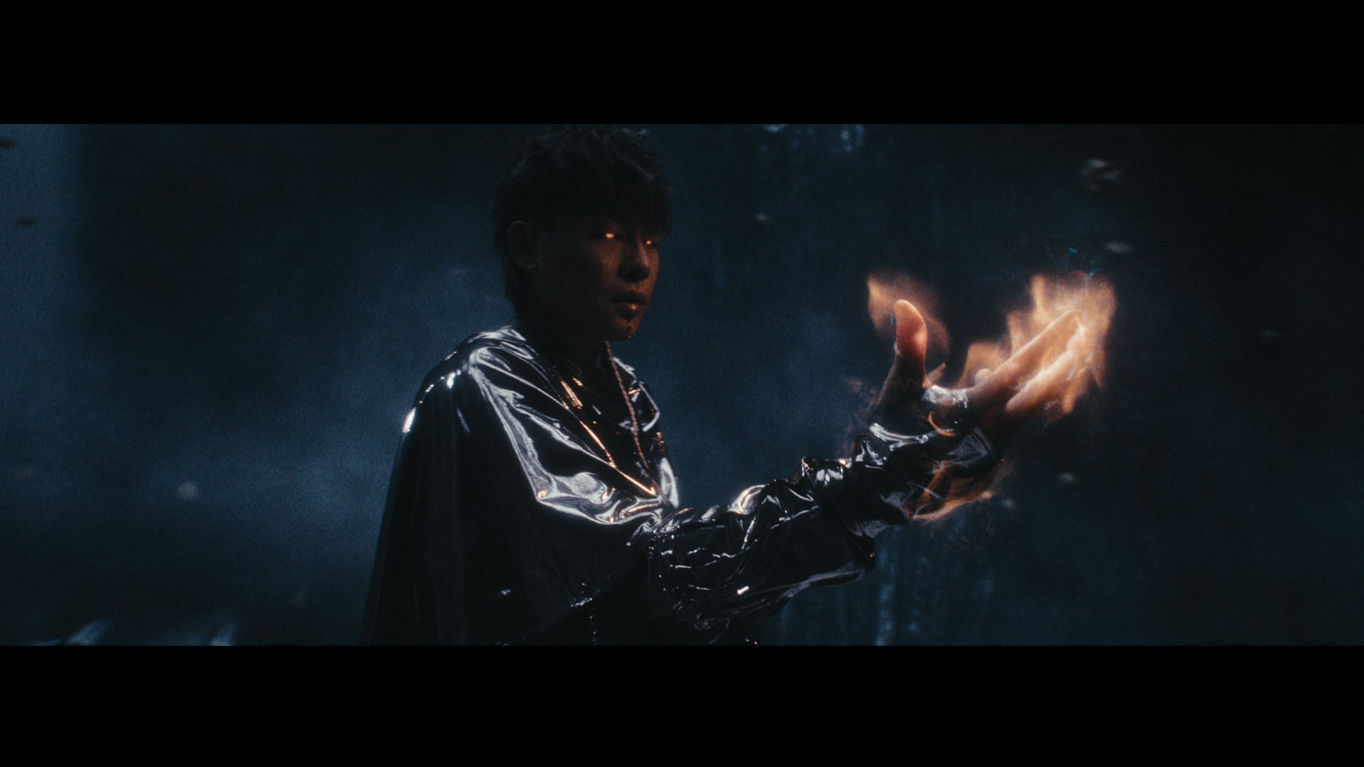 Tiger Hu — Tiger Hu conjures orange energy in the dark chamber