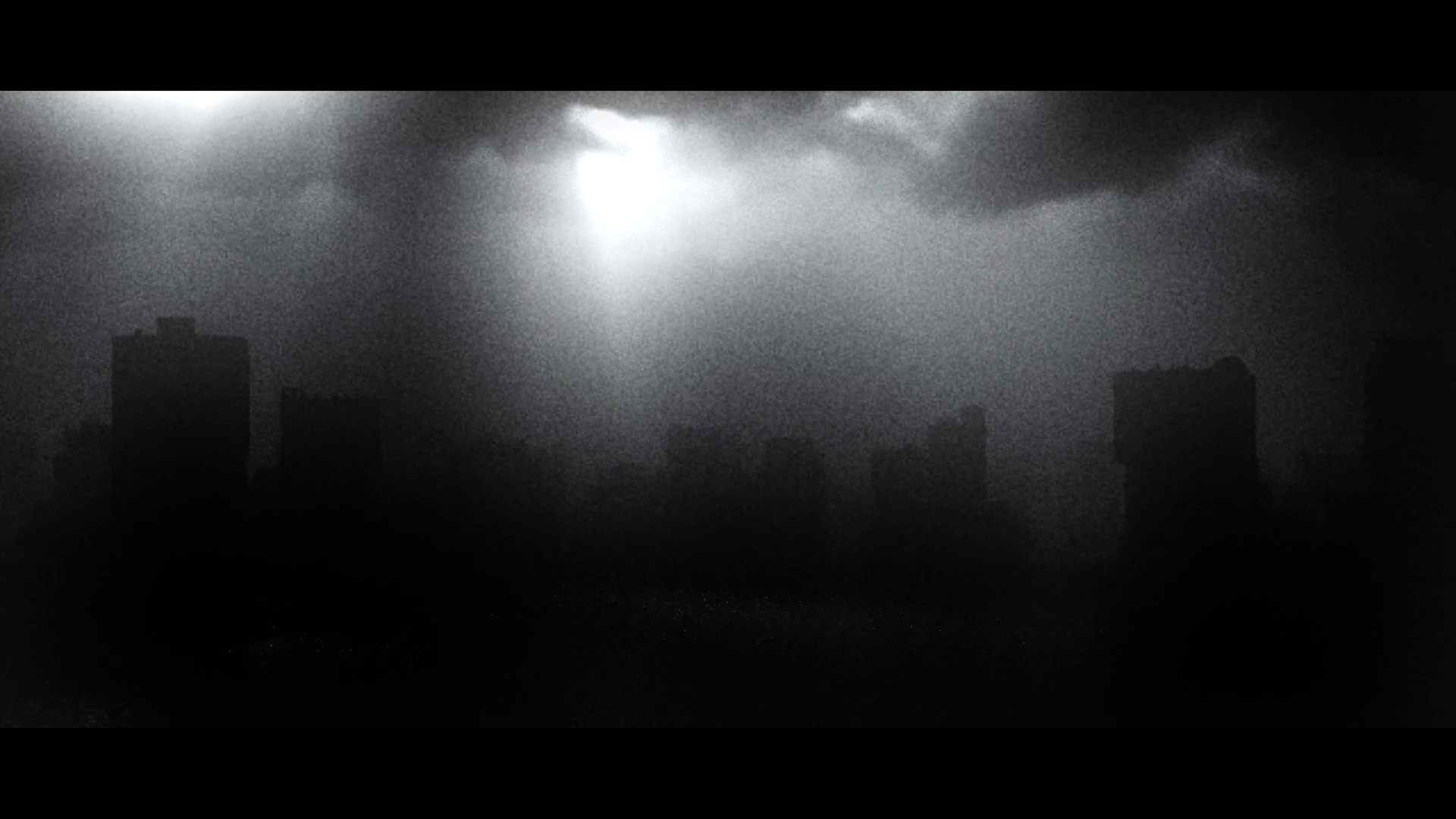 Light breaks above the city