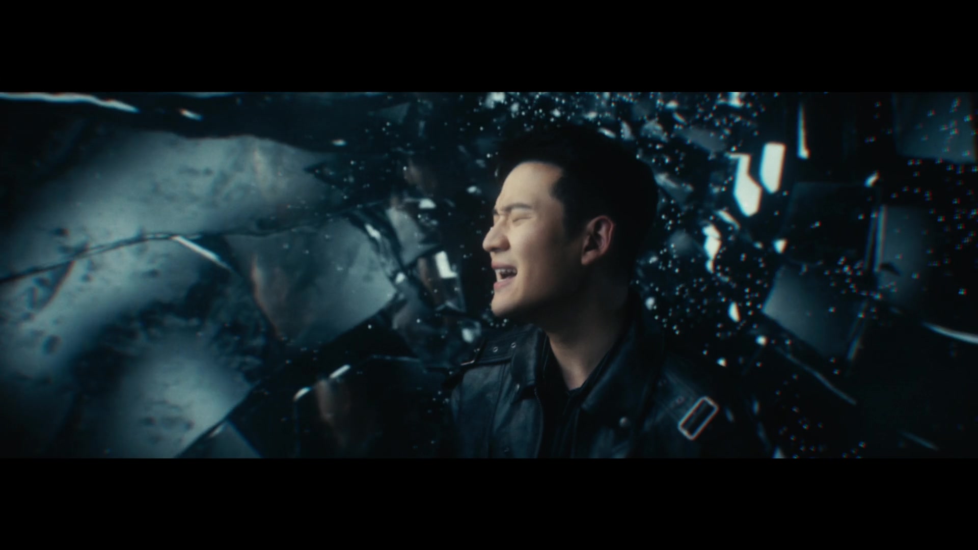 Eric Chou — Performer among fractured reflective forms