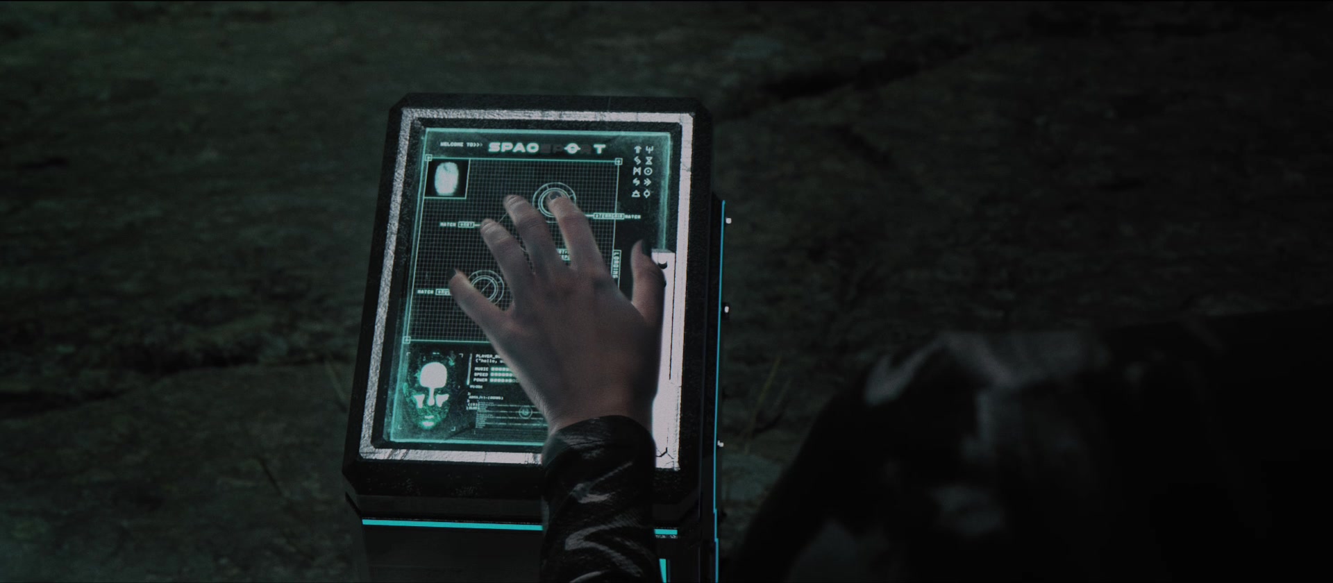 Hand interacting with an illuminated terminal