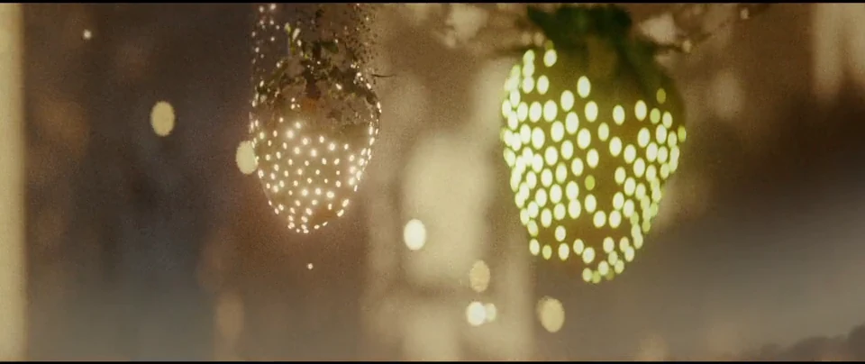Suspended berries filled with golden light.