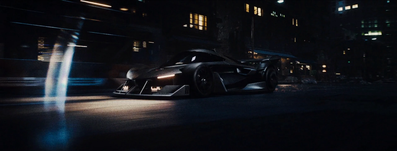 TURNT — the sports car races through the city.